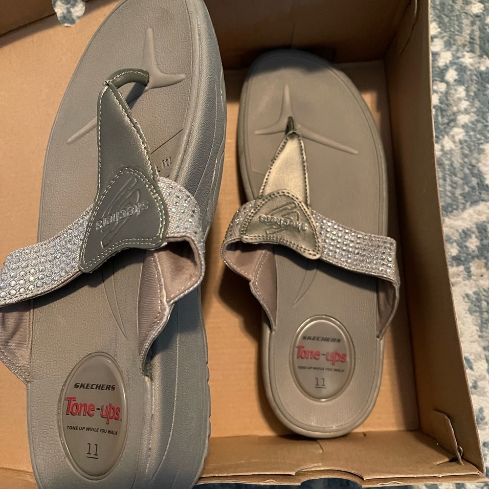 Skechers Tone Ups Soul Train sandals NWOT silver in color size 11